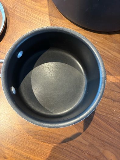 Set of All Clad pots and pans
