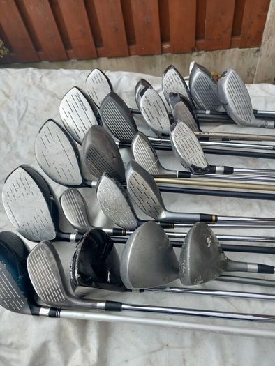 A selection of golf clubs and bags. NOT SELLING SEPARATE