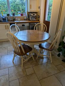 Extendable dining table with matching chairs