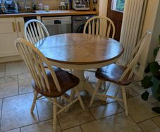 Extendable dining table with matching chairs