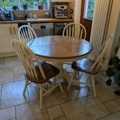 Extendable dining table with matching chairs