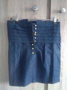 Mini skirt with pockets fits size fits  6 6/8 new