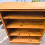 Early 20th Century, Mid 20th Century, Vintage. Solid pine bookcase, sometimes referred to as a farmhouse style dresser top, featuring an antique wax finish. H. 124 , L. 96 , D. 31.5 CM. Image 2