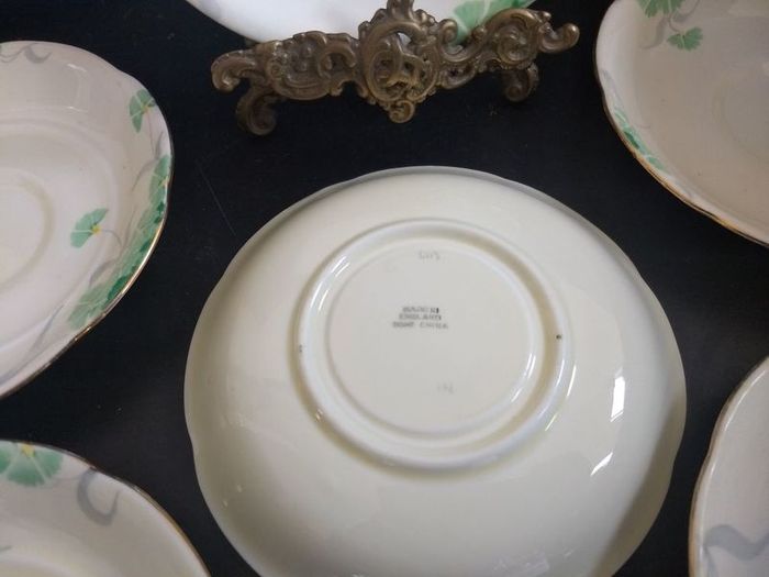 Lovely Set of Six Vintage English Bone China Hand Painted Saucers, (For Use as Petit Fours Plates), with Green Flowers on a Creamy Yellow Base Glaze.