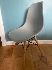 Chairs- modern molded plastic side chair with a minimalist Scandinavian-inspired design.