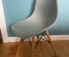 Chairs- modern molded plastic side chair with a minimalist Scandinavian-inspired design.