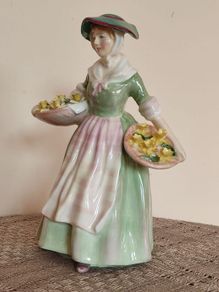 Vintage Royal Doultot porcelain figurine DAFFY DOWN DILLY. Mint condition.
