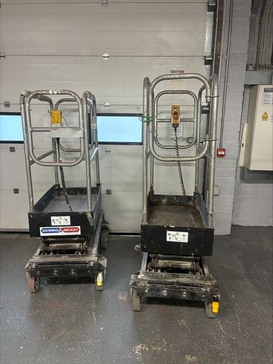 Push around scissor lift
