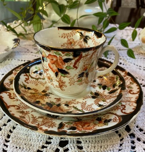 An antique bone china trio