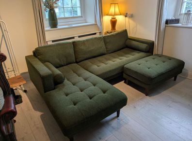 Cooper green fabric corner sofa with left hand facing chaise. Footstool included. In perfect condition.
