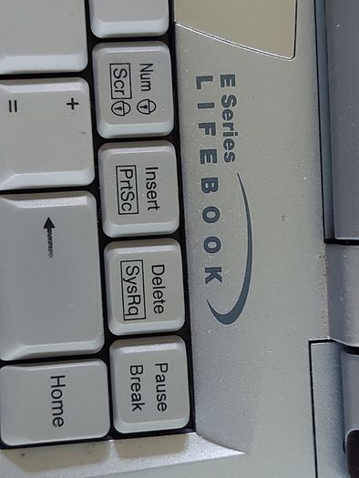 Rare Vintage Fujitsu Siemens Lifebook, E Series, FPC07048B Part number CP127259, Running Windows 2000 Professional, uses 3.5 floppy disk, 20GB HDD, amd all the connecting Ports from 30 years ago Era