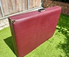 Portable folding massage table