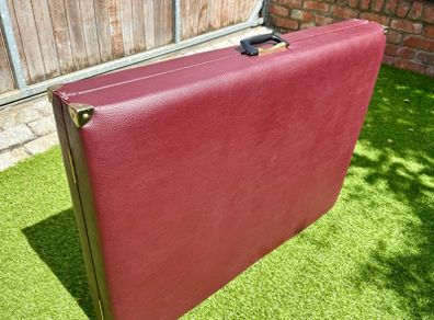 Portable folding massage table