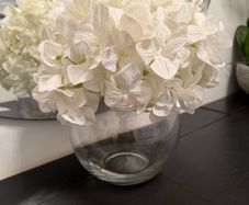 Glass vase with artificial hydrangea