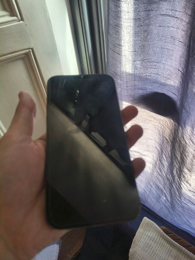 Apple iPhone for sale with a damaged screen