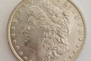 Aunc 1887 morgan silver dollar