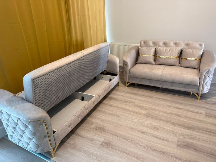 set of sofas with storage and cushions included