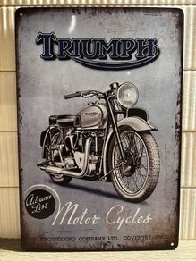 Triumph Tin Metal Sign
