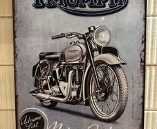Triumph Tin Metal Sign
