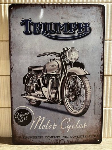 Triumph Tin Metal Sign