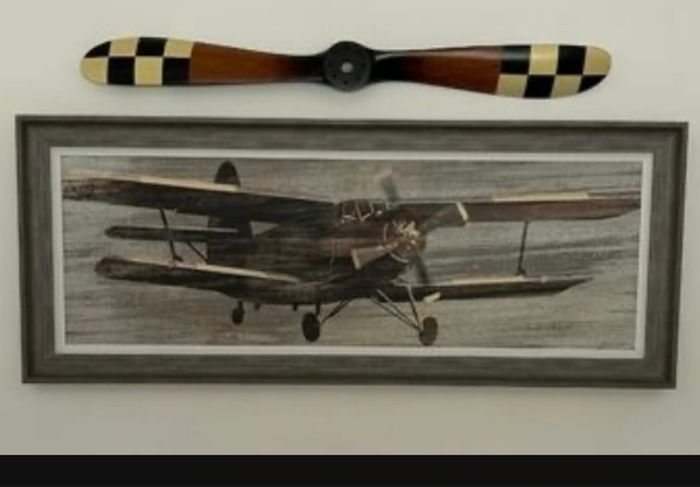 5 foot wide vintage plane frame  and replica propeller