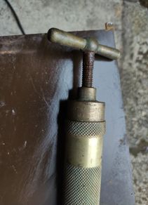 Vintage brass grease gun