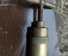 Vintage brass grease gun
