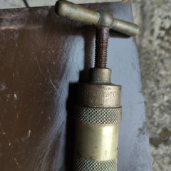 Vintage brass grease gun