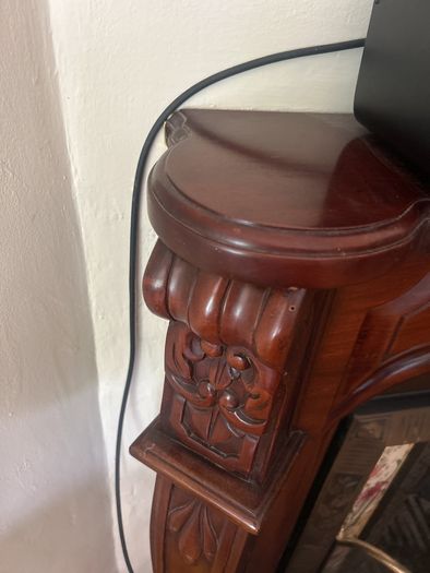 Ornate mahogany fire surround/mantle