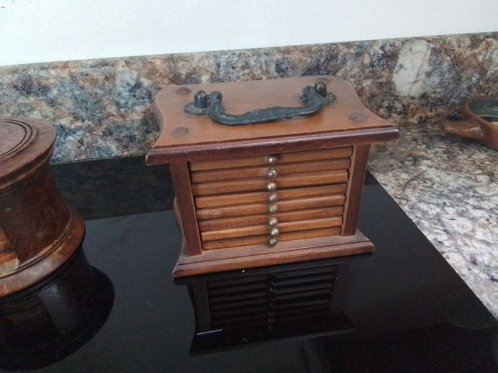 Three sets of Coasters in Containers