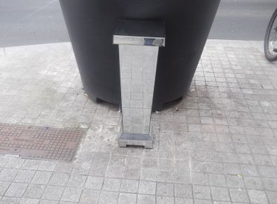a shops display stand with mirror all round it