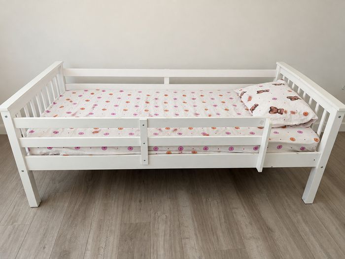 Wooden frame single bed plus mattress