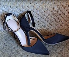 Closed Toe Black Heels...size 4