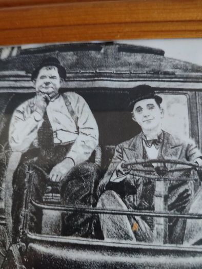 Laurel and Hardy driving framed Print black and white.