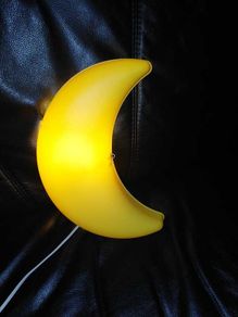 Yellow crescent moon wall light