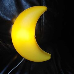 Yellow crescent moon wall light