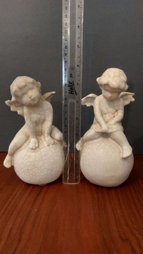 Lovely Vintage Pair of Ceramic Baby Winged Angels Sitting on Globes with a Very Tactile Cream Coloured Crackle Glaze