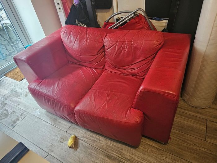 Red Leather two seater couch