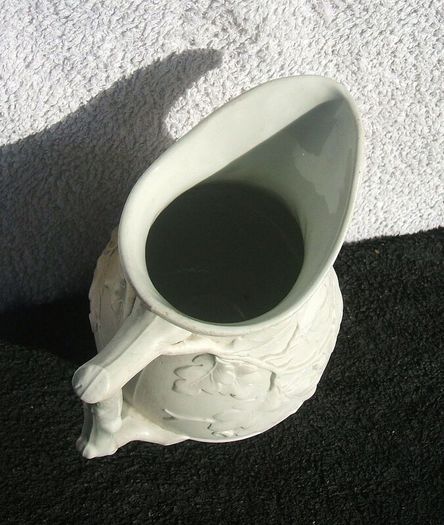 An antique Parian-bisque jug with moulded oak leaves & acrons pattern (c.1870)