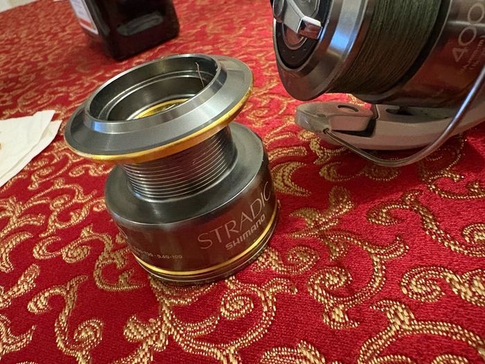 shimano stradic 4000 with spare spool and spiderwire braid
