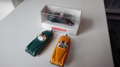 3 Jaguar XK120 model cars