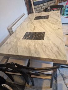 marble table and 6 chairs