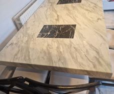 marble table and 6 chairs