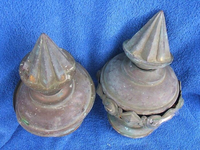 Two antique copper metal finials