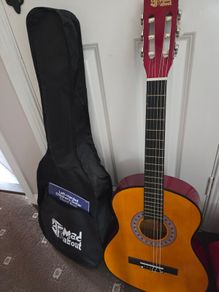 Childs left handed guitar