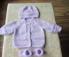 Hand knitted Baby Cardigans hats & booties.