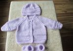 Hand knitted baby  cardigans.