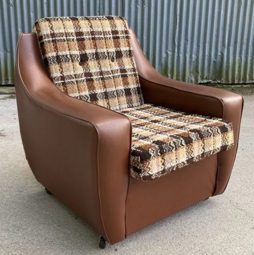 Vintage 1970s armchair on castors.
