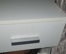 White bedside table