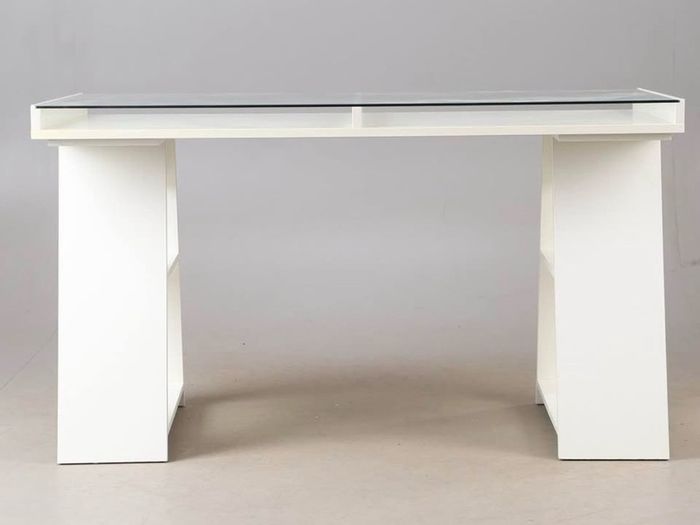 Study/ Office table Used but in great condition This is a modern minimalist table with a sleek white finish and a glass top